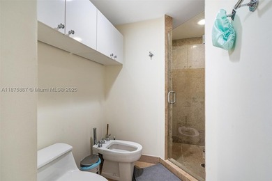This beautiful furnished residence features an open kitchen with - photo 16