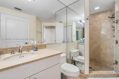 This beautiful furnished residence features an open kitchen with - photo 18