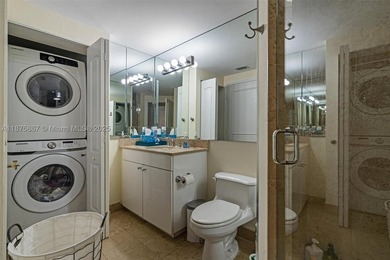 This beautiful furnished residence features an open kitchen with - photo 19