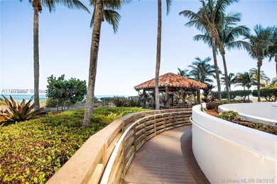 This beautiful furnished residence features an open kitchen with - photo 31