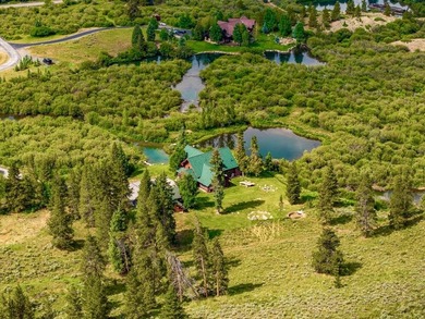 Set on 14 pristine acres along the Swan River, 2717 Tiger Road - photo 38