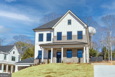 Lake Home For Sale in Flowery Branch, Georgia