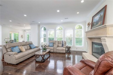 Located on an exceptional +/-0.6 acre golf course lot in - photo 12