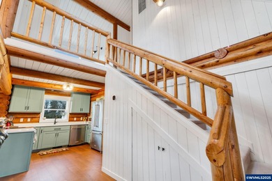 Welcome to this beautifully updated log-style home on 1.5 acres
