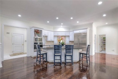 Located on an exceptional +/-0.6 acre golf course lot in - photo 13