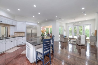 Located on an exceptional +/-0.6 acre golf course lot in - photo 14