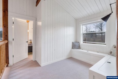 Welcome to this beautifully updated log-style home on 1.5 acres