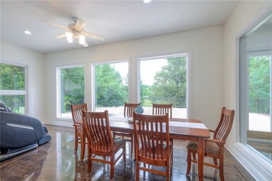 Located on an exceptional +/-0.6 acre golf course lot in - photo 16