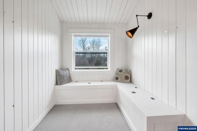 Welcome to this beautifully updated log-style home on 1.5 acres