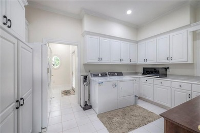 Located on an exceptional +/-0.6 acre golf course lot in - photo 18