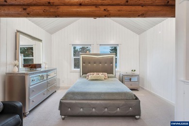 Welcome to this beautifully updated log-style home on 1.5 acres