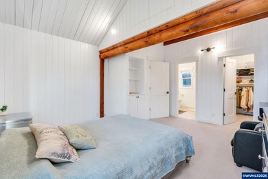 Welcome to this beautifully updated log-style home on 1.5 acres