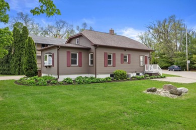 Welcome home to this beautiful Lake Geneva bungalow! Because the - photo 2