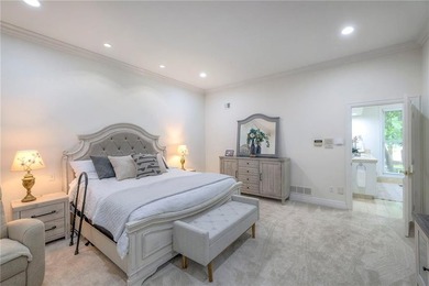 Located on an exceptional +/-0.6 acre golf course lot in - photo 24
