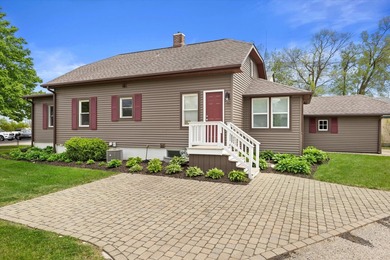 Welcome home to this beautiful Lake Geneva bungalow! Because the - photo 5