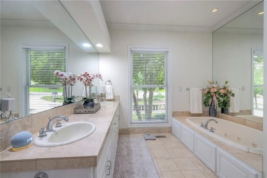 Located on an exceptional +/-0.6 acre golf course lot in - photo 26