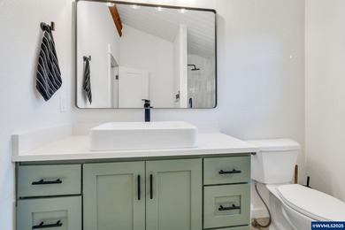 Welcome to this beautifully updated log-style home on 1.5 acres