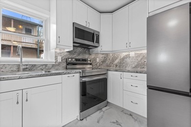 Welcome home to this beautiful Lake Geneva bungalow! Because the - photo 9