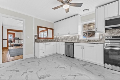 Welcome home to this beautiful Lake Geneva bungalow! Because the - photo 10