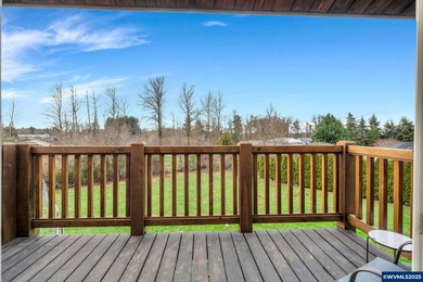 Welcome to this beautifully updated log-style home on 1.5 acres