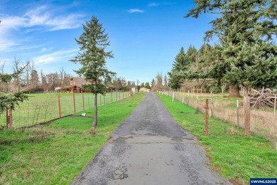 Welcome to this beautifully updated log-style home on 1.5 acres