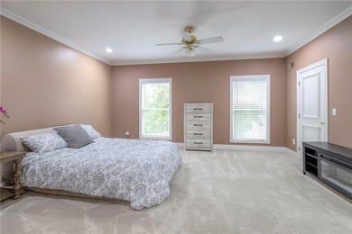 Located on an exceptional +/-0.6 acre golf course lot in - photo 35