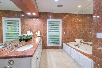 Located on an exceptional +/-0.6 acre golf course lot in - photo 39