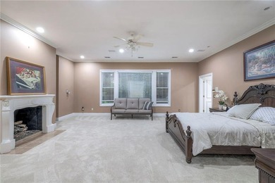 Located on an exceptional +/-0.6 acre golf course lot in - photo 41
