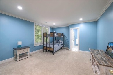 Located on an exceptional +/-0.6 acre golf course lot in - photo 43