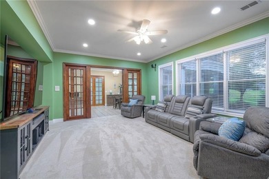 Located on an exceptional +/-0.6 acre golf course lot in - photo 45