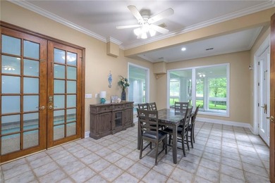 Located on an exceptional +/-0.6 acre golf course lot in - photo 46