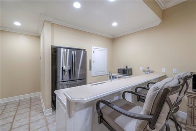 Located on an exceptional +/-0.6 acre golf course lot in - photo 47
