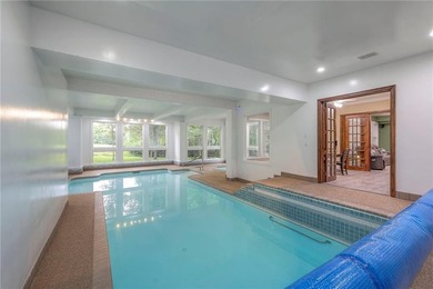 Located on an exceptional +/-0.6 acre golf course lot in - photo 48