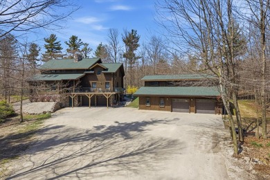 One-of-a-kind custom half log sided home on 24.5 wooded acres - photo 2