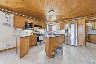 One-of-a-kind custom half log sided home on 24.5 wooded acres - photo 10