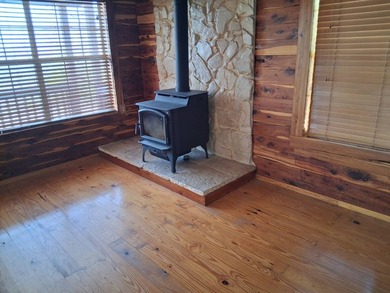 This 884 sq ft log cabin sits in Sardis Acres overlooking the - photo 14