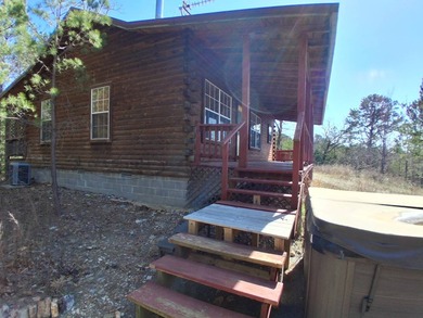This 884 sq ft log cabin sits in Sardis Acres overlooking the - photo 24