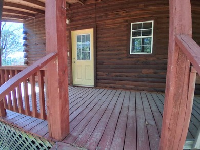 This 884 sq ft log cabin sits in Sardis Acres overlooking the - photo 29
