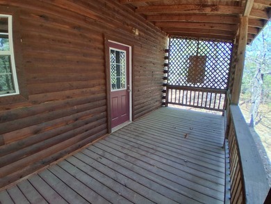 This 884 sq ft log cabin sits in Sardis Acres overlooking the - photo 30