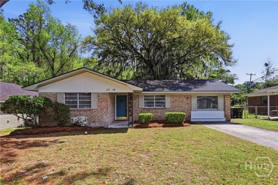 Updated, affordable, and full of potential, this all-brick ranch - photo 1