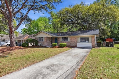 Updated, affordable, and full of potential, this all-brick ranch - photo 2