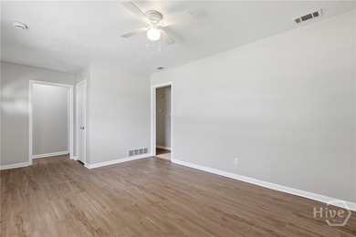 Updated, affordable, and full of potential, this all-brick ranch - photo 5