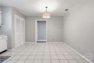 Updated, affordable, and full of potential, this all-brick ranch - photo 8