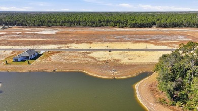 Cleared, and build-ready lot with Water Views located in the - photo 12