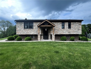 This well-maintained 3-bedroom, 2-bathroom home is situated on a - photo 1