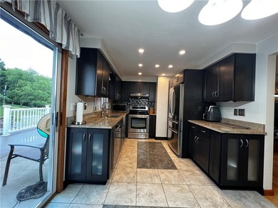 This well-maintained 3-bedroom, 2-bathroom home is situated on a - photo 6