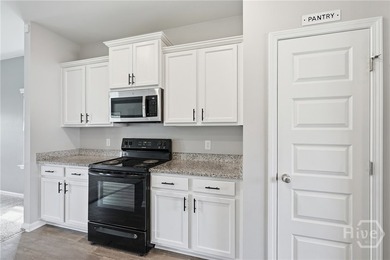 Welcome to 175 Vale Loop, where modern efficiency meets low - photo 10