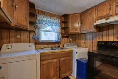 Charming 3 bedroom, one level home on over 5 ACRES WITH CREEK &