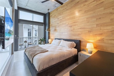 Oversized 1-bedroom loft-style condo (802 SF) at The Meridian