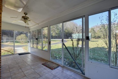 Charming 3 bedroom, one level home on over 5 ACRES WITH CREEK &